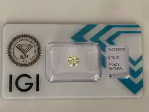 IGI-gecertificeerde natuurlijke Fancy Light Yellow diamant,0,78 karaat kopen? Bied vanaf 1200!