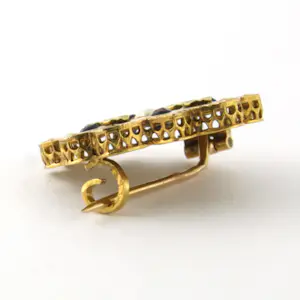 18k gouden broche bezet met saffier en parel - 2.7 gram kopen? Bied vanaf 290!