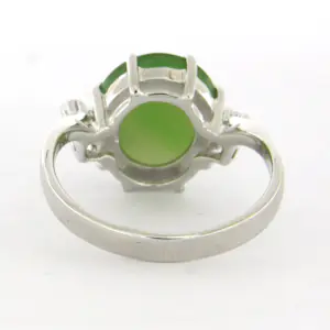 14k wit gouden ring bezet met jade en briljant geslepen diamant tot. 0.10ct kopen? Bied vanaf 350!