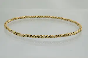 4 - Fraai afgewerkte 14Krt geel gouden armband - gedraaid model kopen? Bied vanaf 395!